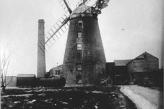 Tower Mill with sails and chimney